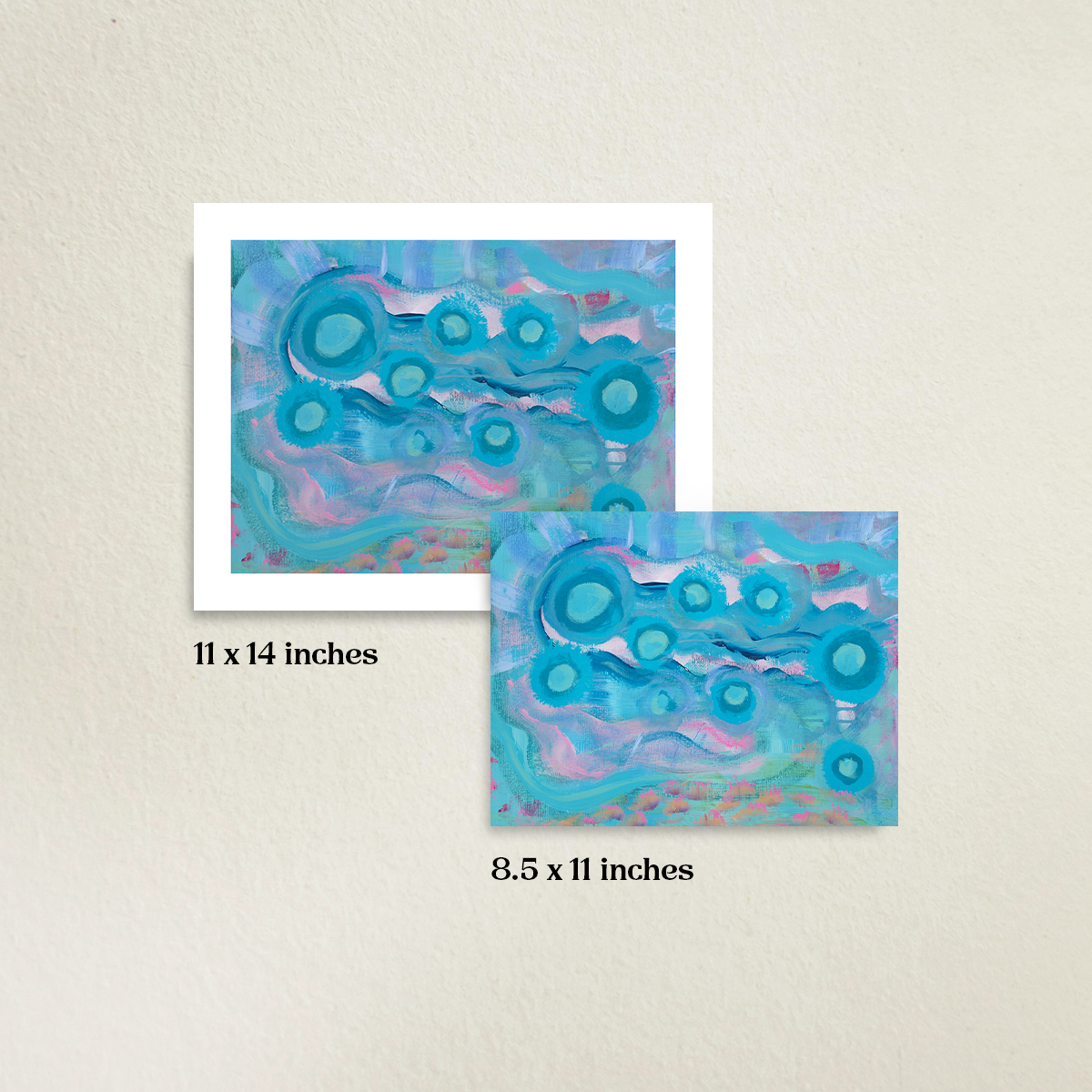 Your Weird is Glowing 11 x 14 inch fine art print with an 8.5 x 11 inch fine art print. A beige wall is in the background. Sizes are labeled under each print. Limited Edition prints are next to each other to compare the size difference.