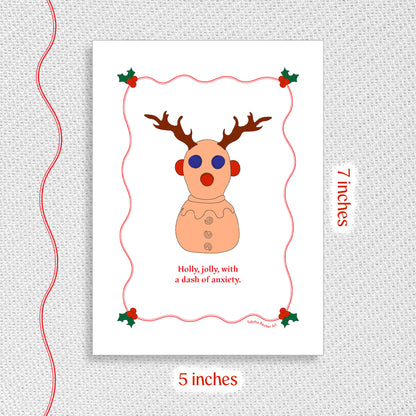 ADHD Holiday card Christmas card featuring a clever illustration of the neurodivergent toy wearing festive reindeer antlers. The image has a gray background with red text that shows the length and width of the card, 5x7 inches.