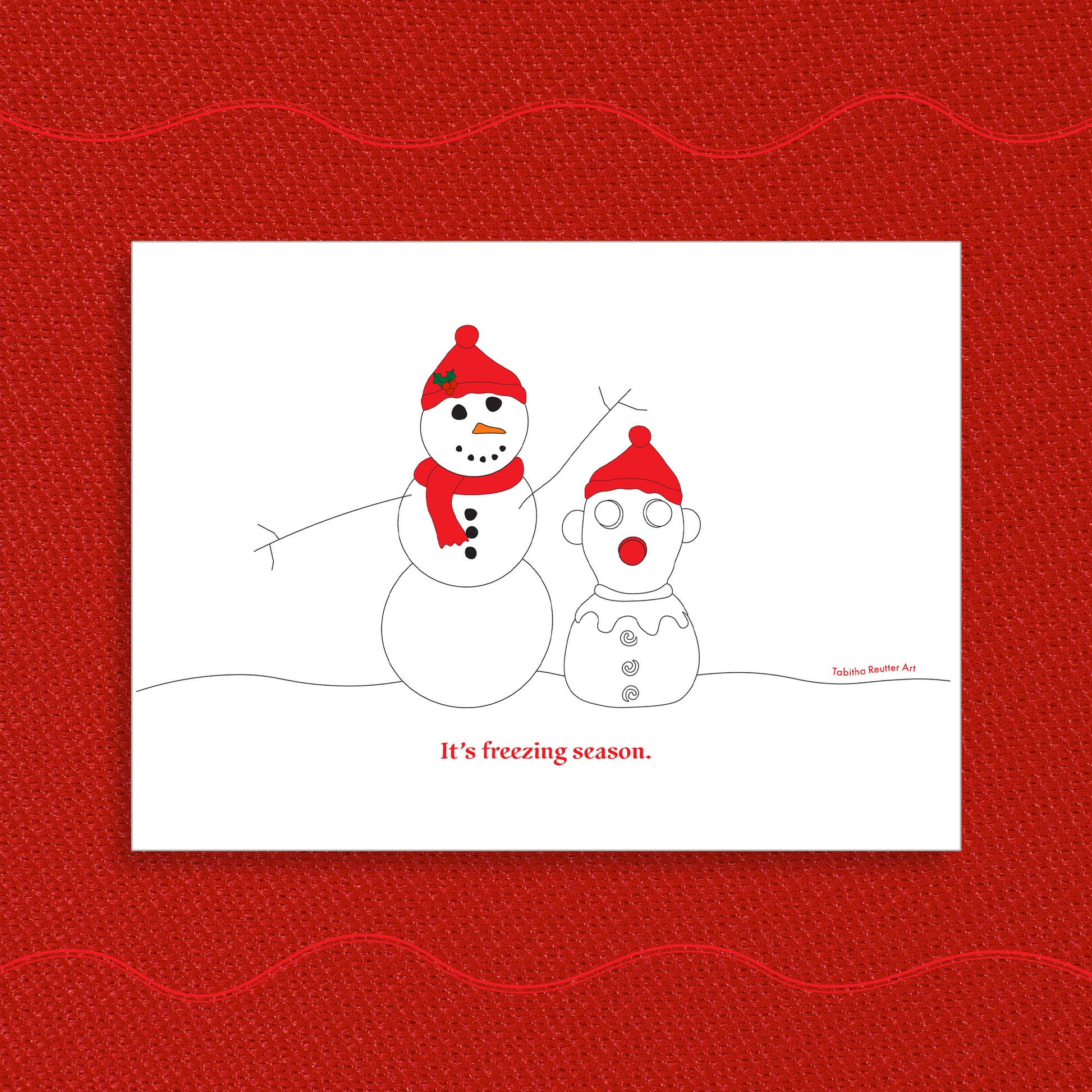 White Christmas greeting card displayed on a vibrant Holiday red textured background. On the greeting card, a simple line drawing illustration of a snowman next to a snow-person version of the neurospicy squeeze toy, Panic Pete, on a snowy hill. Red text, under the artwork, reads: “It’s freezing season.”