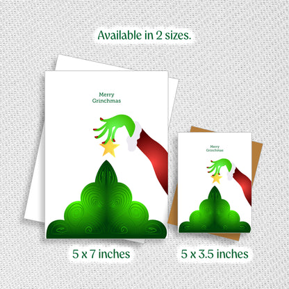 Two Christmas-themed greeting cards with Grinch design on a textured gray background.