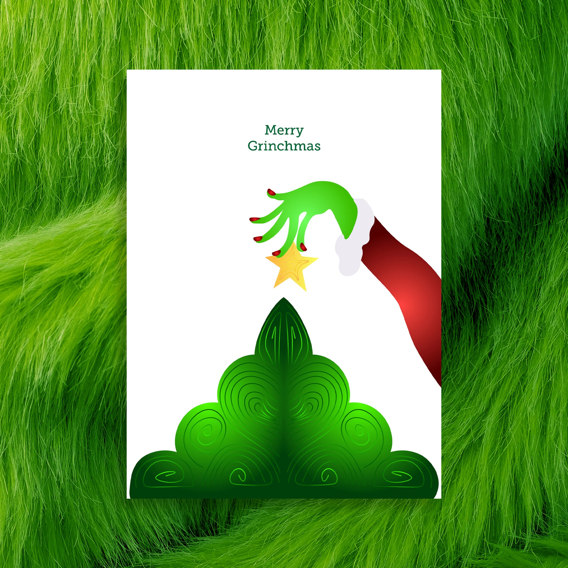 Card with a hand holding a star above a Christmas tree, on a green furry background