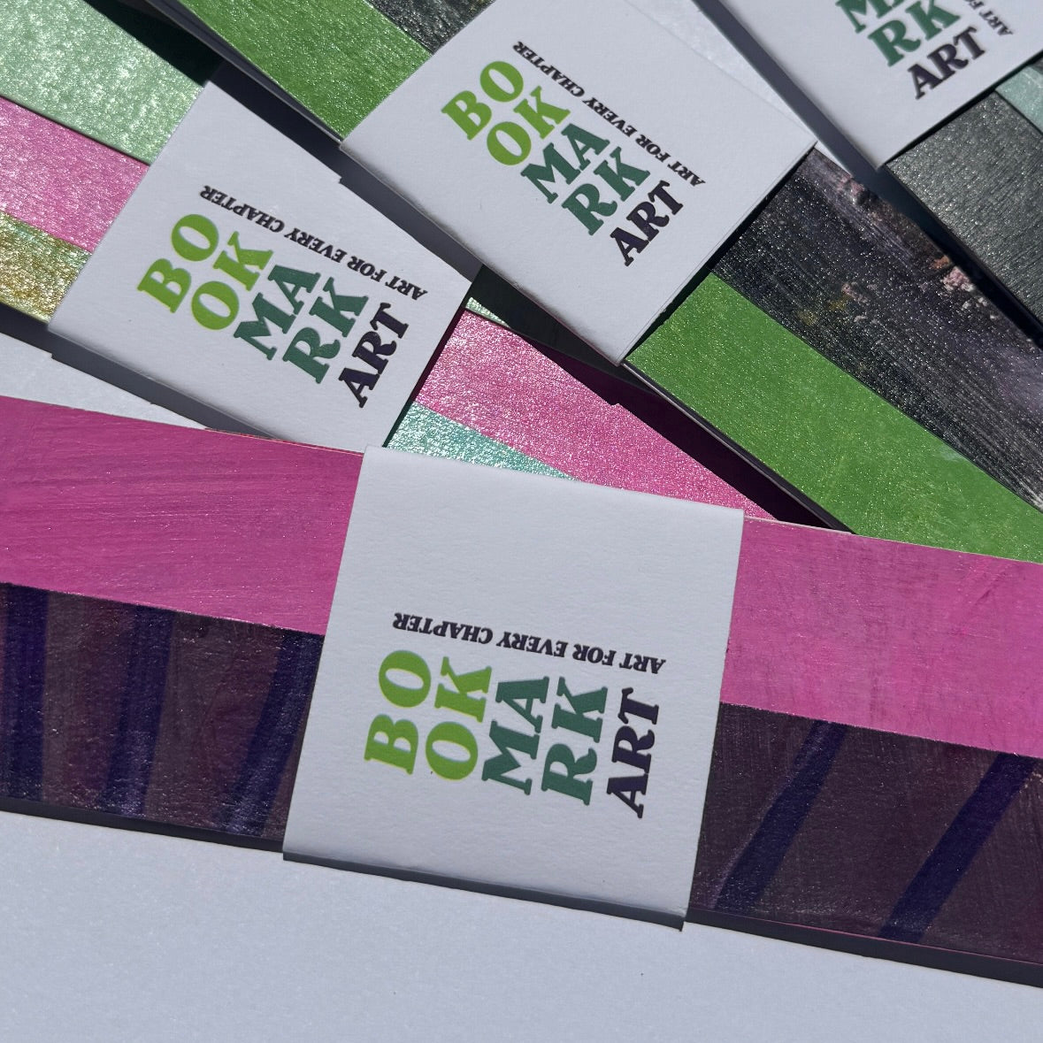 Colorful bookmarks with 'Book a Mark Art' labels on a white background.