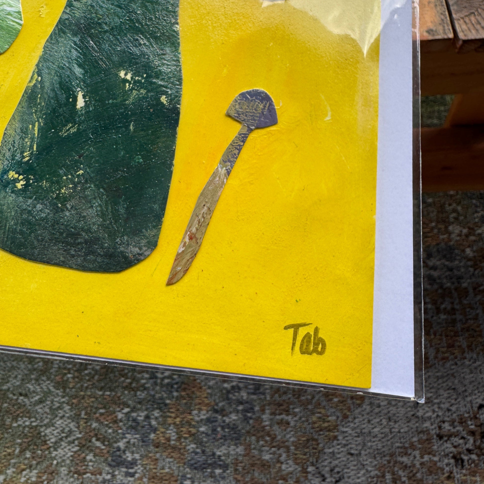 Artistic depiction of a mushroom on a yellow background with 'Tab' signature.