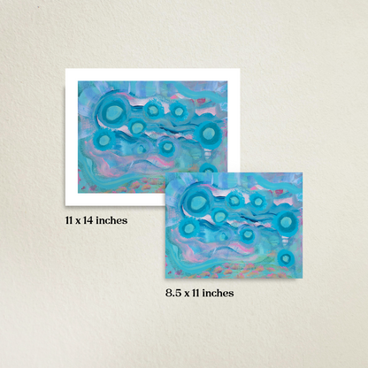 Your Weird is Glowing 11 x 14 inch fine art print with an 8.5 x 11 inch fine art print. A beige wall is in the background. Sizes are labeled under each print. Limited Edition prints are next to each other to compare the size difference.